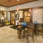 Cyber Lounge with rolling barnyard art glass paned doors.